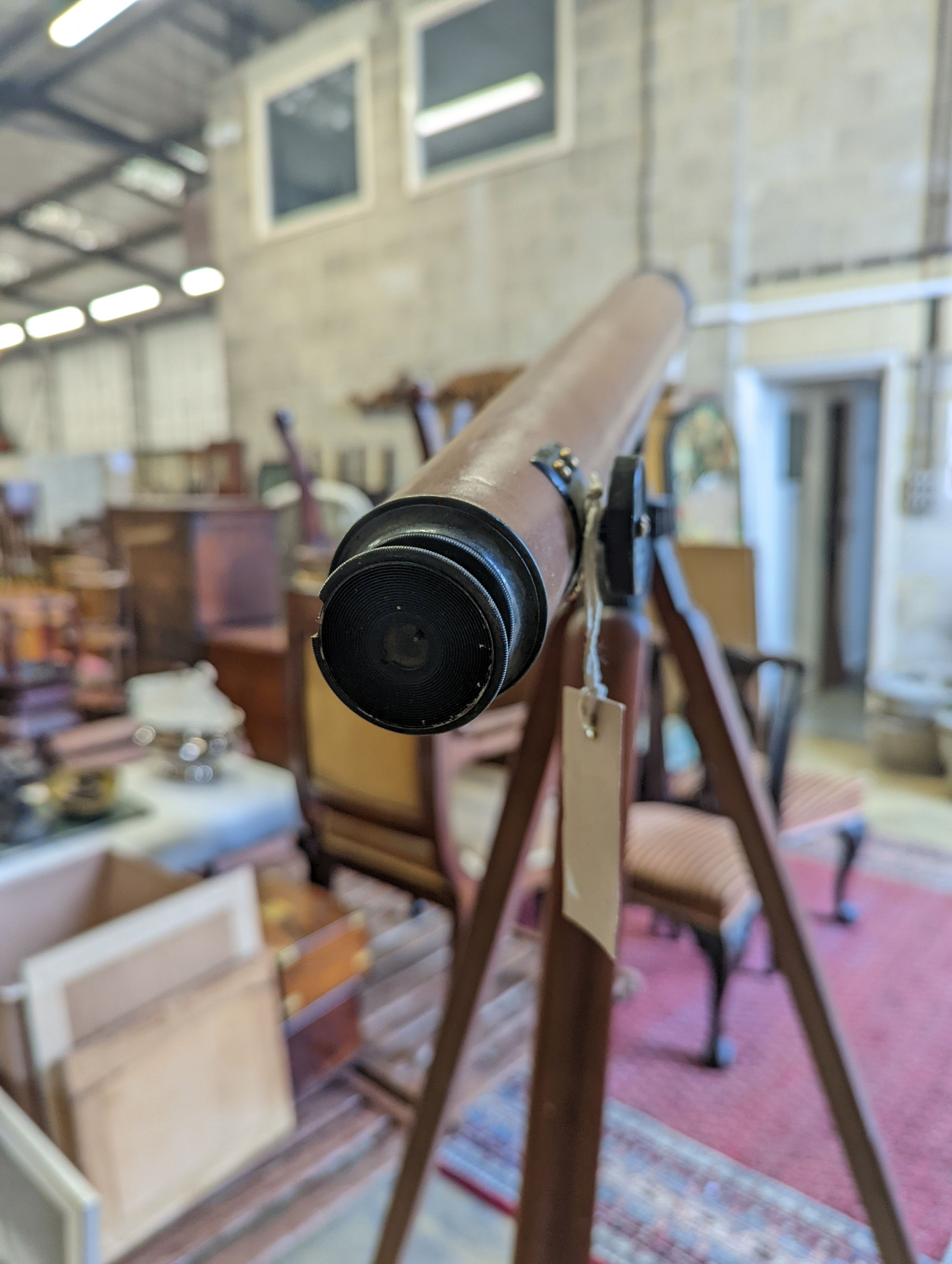A Victorian telescope on a stand